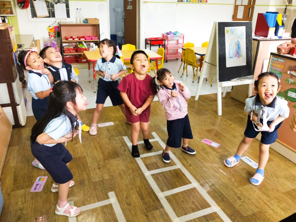 Tutor Time Intercon children enjoying a movement activity in the classroom